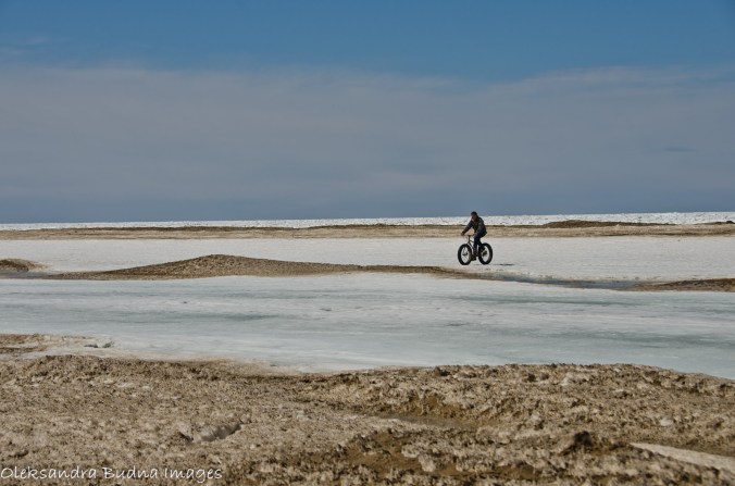 biking on the lake in the winter