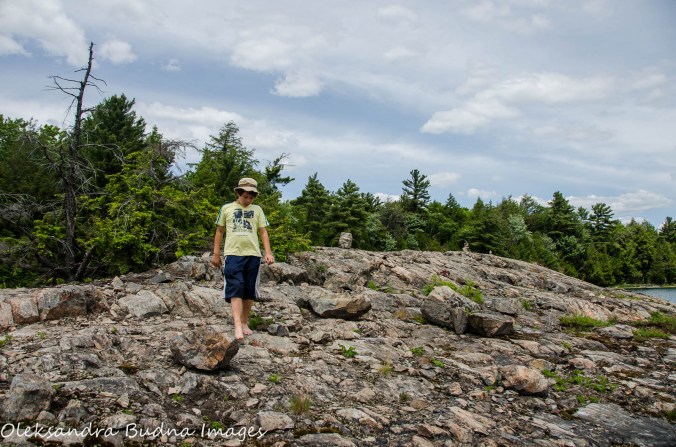 exploring an island on O.S.A. Lake at Killarney