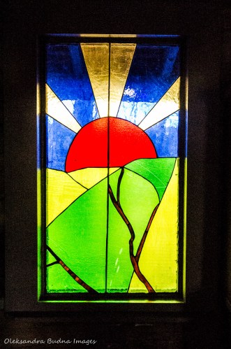 stained glass at Settler's Cabin at Elliott Tree Farm