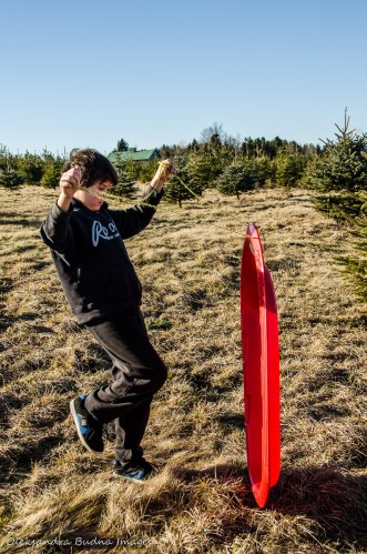 playing with a sled at Elliott Tree Farm