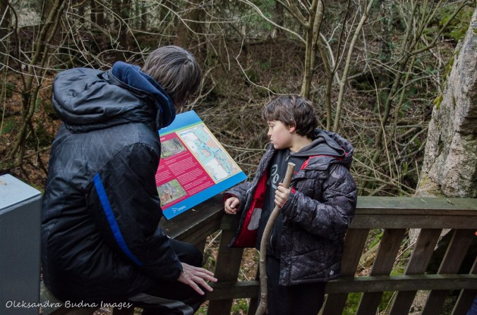 reading an information panel at Mono Cliffs Provicial Park