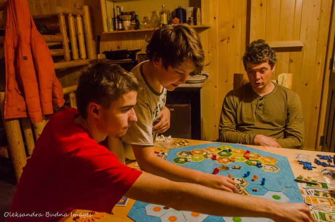 playing Settlers of Catan in a cabin in Killarney