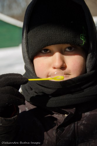 blowing bubbles in the winter