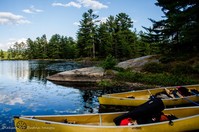 loaded canoes near the shore on Balsam Lake in Killarney