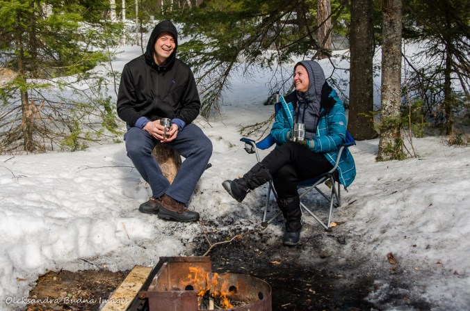 sitting near the campfire in the winter