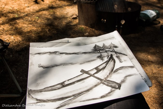 drawing of a canoe with charcoal