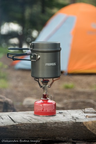 camping stove with a tent in the background