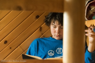 reading inside La Cigale rustic shelter in Parc National d'Aiguebelle