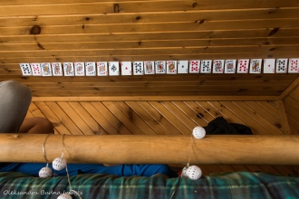 cards on the roof inside La Cigale rustic shelter in Parc National d'Aiguebelle