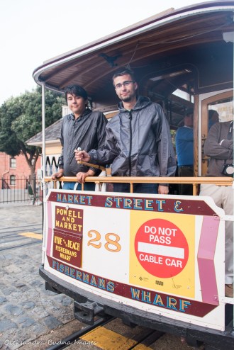riding a cable car in San Francisco