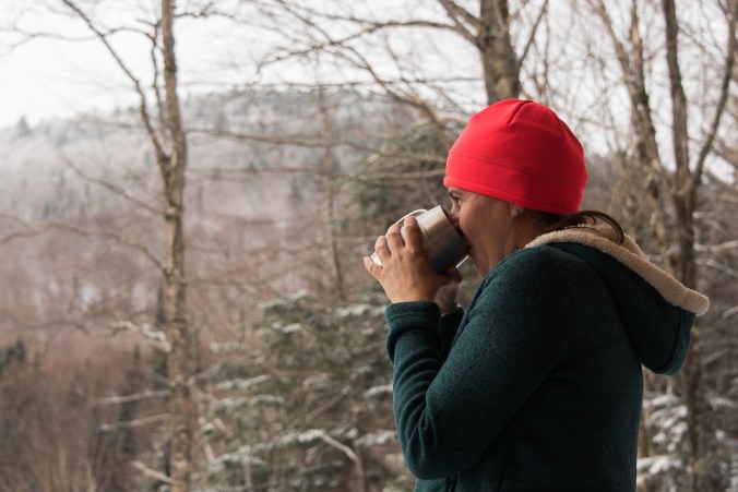 having coffee outside Spica rustic shelter at Parc national du Mont-Mégantic in Quebec