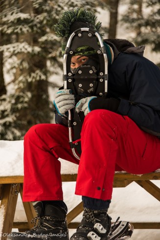 putting on snowshoes