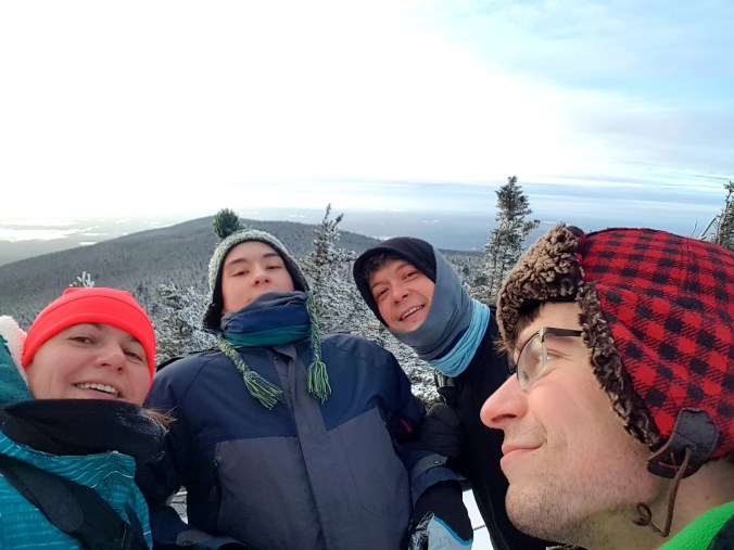 group selfie on top of Mont Mégantic in the winter