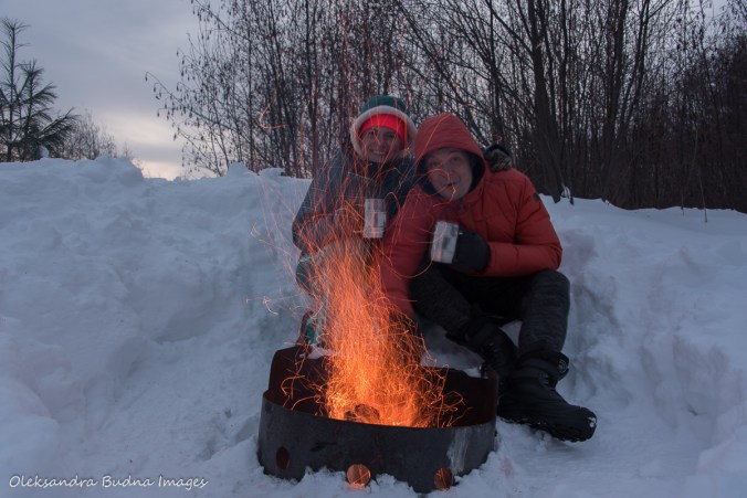 sitting by a campfire at Windy Lake
