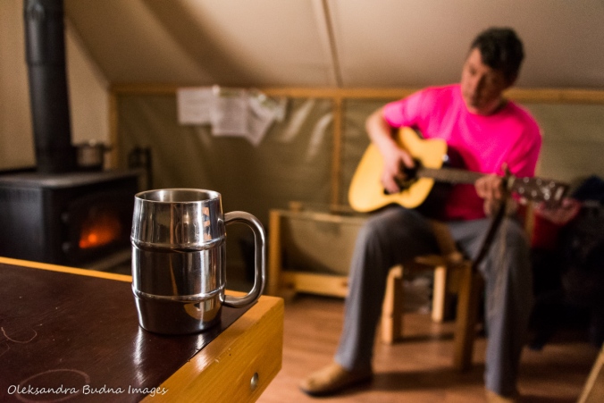 morning coffee and guitar in four-season tent in Gatineau