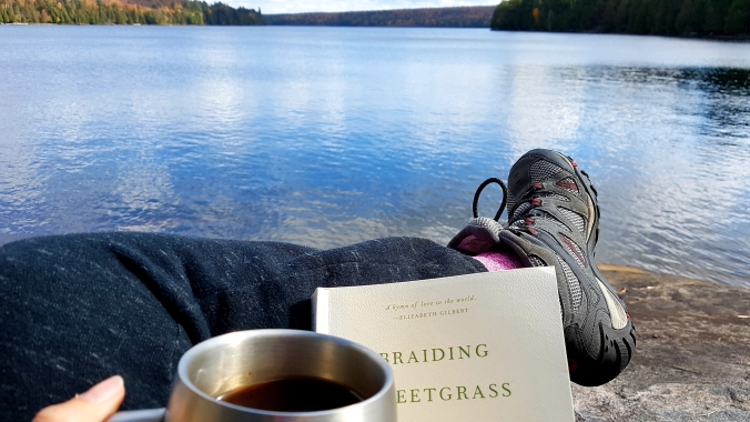 book, coffee and view of the lake