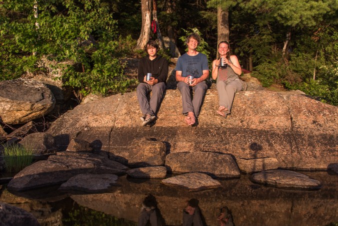 enjoying tea by the water on a campsite on Manitou Lake in Algonquin